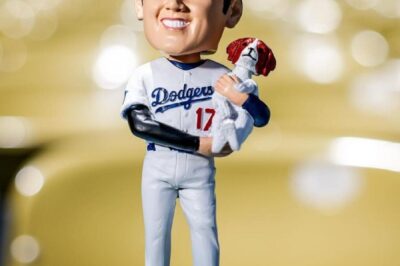 Shohei Ohtani Bobblehead MANIA: Dodgers Fans Brace for Wild Giveaway Chaos The Dodgers just dropped bombshell news—an ultra-rare “50-50” Shohei Ohtani bobblehead giveaway is coming, and fans are already losing it. Half in Dodgers gear, half in Angels red, this collectible is expected to cause a stadium frenzy. Will you be one of the lucky few to grab one?