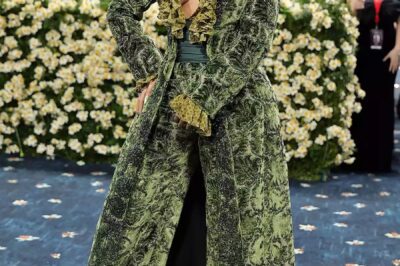 “Cardi B Turns Heads in Show-Stopping Green Burberry Power Suit at the 2025 Met Gala — Grammy-Winning Rap Icon Makes Her Sixth Appearance a Statement Moment, Blending High Fashion and Eco-Chic Vibes in Bold Look That Sends Fans and Fashion Critics Into a Frenzy on the Iconic Met Steps”